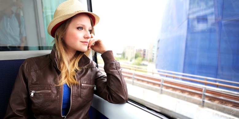 Young female commuter in the Copenhagen metro